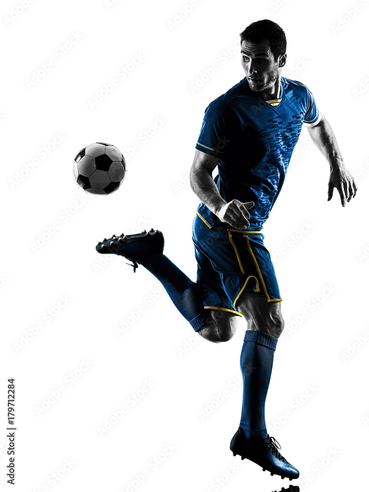 Naklejka premium one caucasian soccer player man playing in silhouette isolated on white background