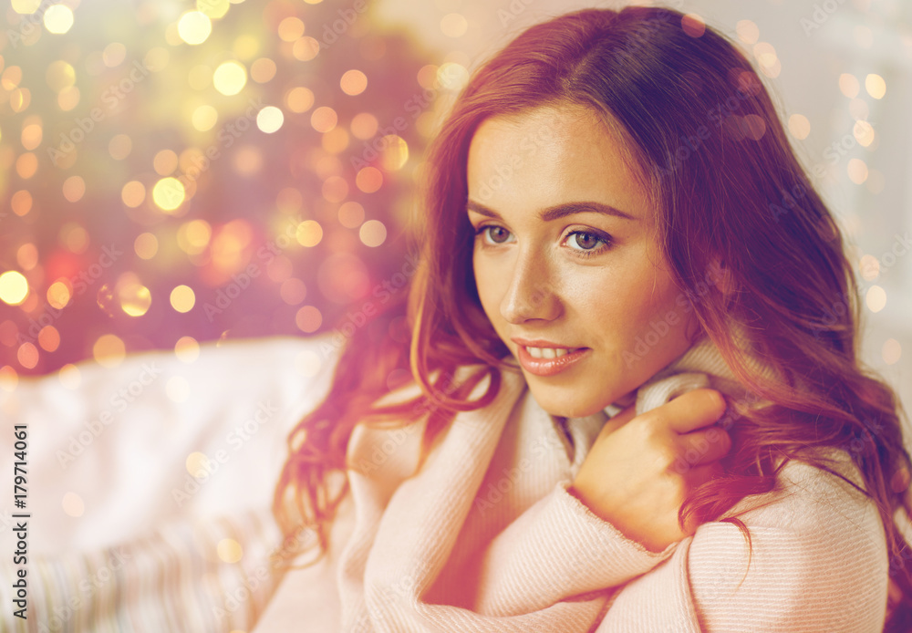 happy young woman with plaid at home for christmas happy young woman with plaid at home for christmas