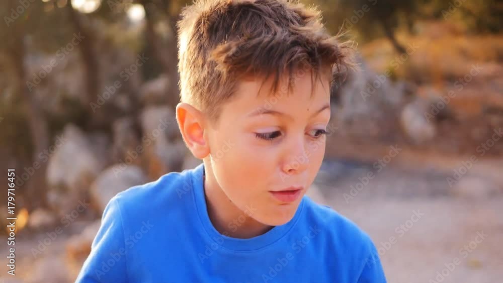 Cheerful little boy play the ape Cheerful little boy play the ape