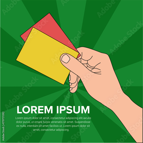 Hand holding up red card and yellow card