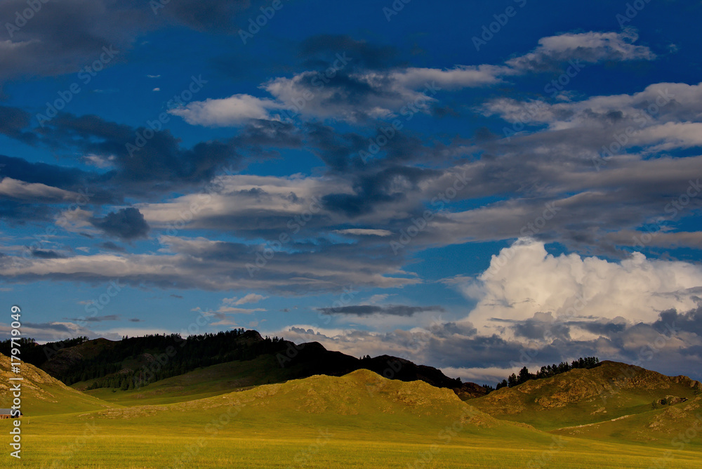 Sunset in the steppes of the Altai mountains