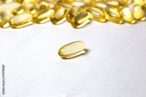 omega 6: conjugated linoleic acid (CLA) in capsules on the white background photo