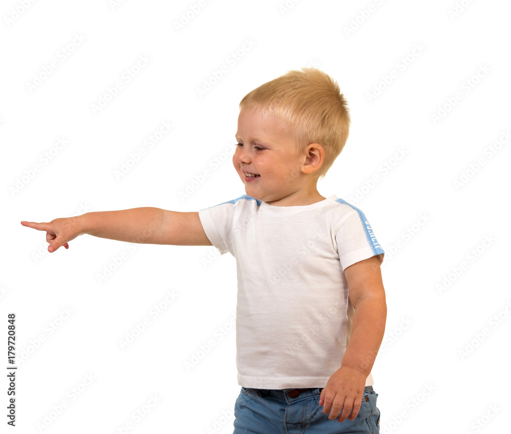 Little smiling boy showing finger on banner, isolated on white Little smiling boy showing finger on banner, isolated on white