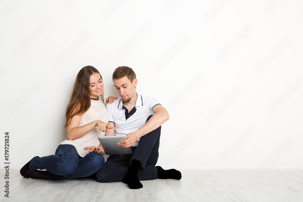 Couple shopping online with digital tablet Couple shopping online with digital tablet