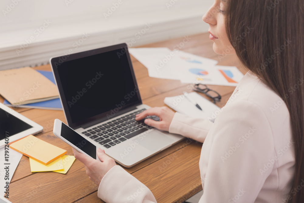 Business woman using phone with blank screen Business woman using phone with blank screen