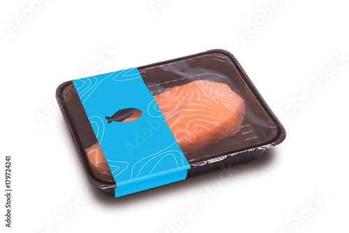 raw salmon in the package. isolated on white background