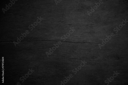 Black wood texture or background. © Rattana