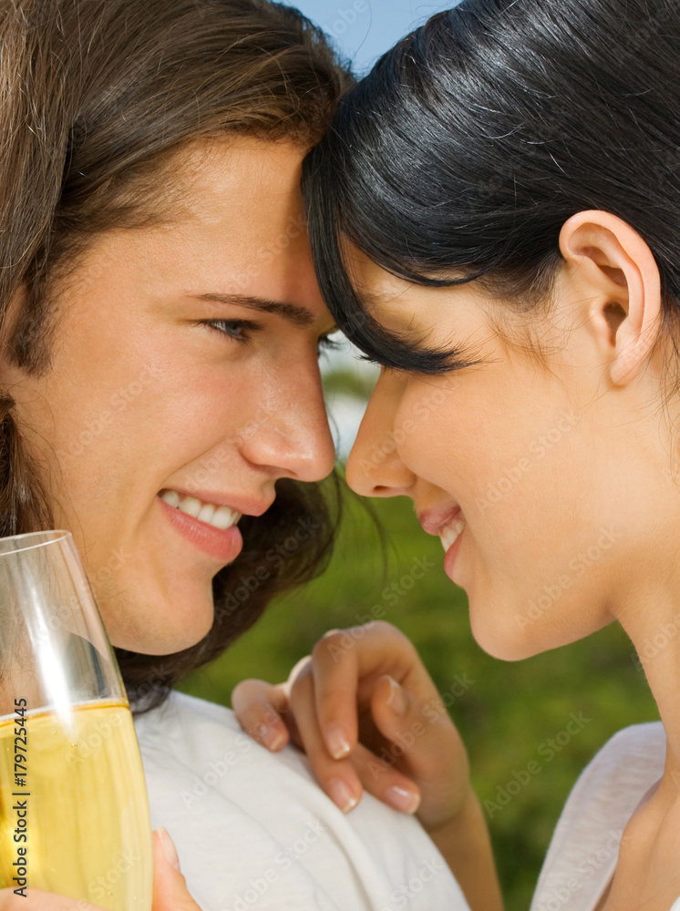 Young happy couple with champagne, outdoor Young happy couple with champagne, outdoor