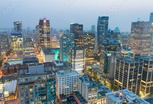 Night aerial view of Vancouver skyscrapers from city rooftop - British Columbia  Canada