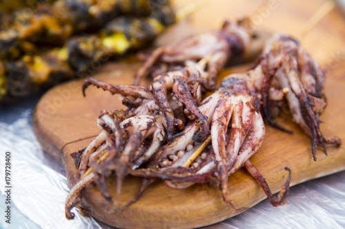 Fototapeta Naklejka Na Ścianę i Meble -  Barbeque seafood, grilled octopus at a street market