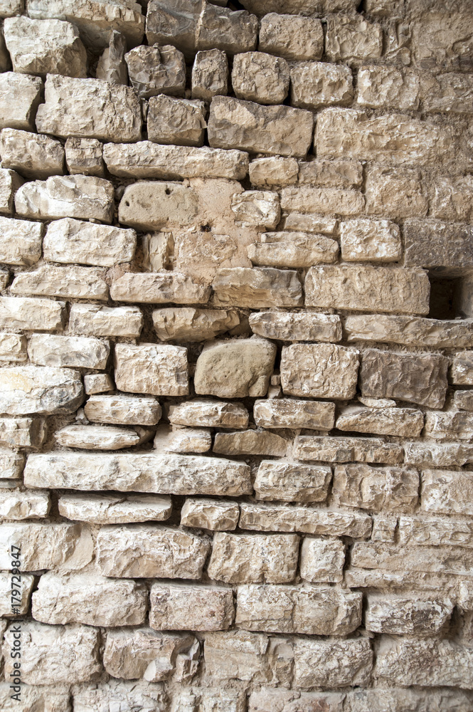 Gubbio, Perugia, Italy - ancient wall in a small typical street of the Gubbio village. Gubbio, Perugia, Italy - ancient wall in a small typical street of the Gubbio village.