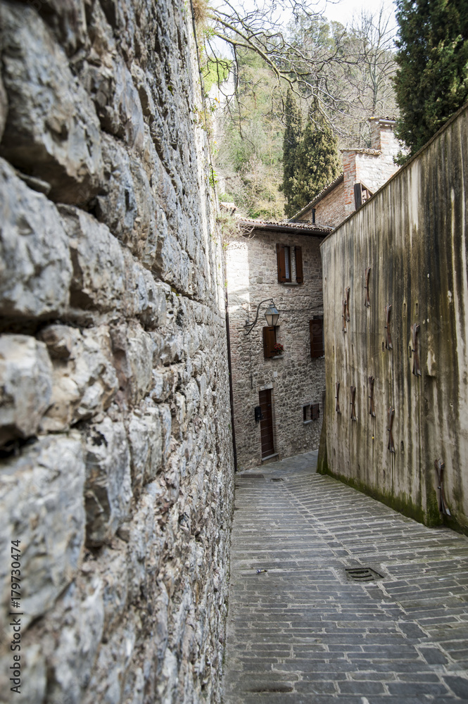 Gubbio, Perugia, Italy - small typical street of the Gubbio village. Gubbio, Perugia, Italy - small typical street of the Gubbio village.