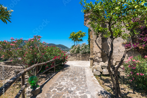 A summer day visiting Aragonese Castle and looking toward Capri and Vesuvi Ischia Ponte  Ischia  Phlegrean Islands  Tyrrhenian Sea  Italy  South Europe
