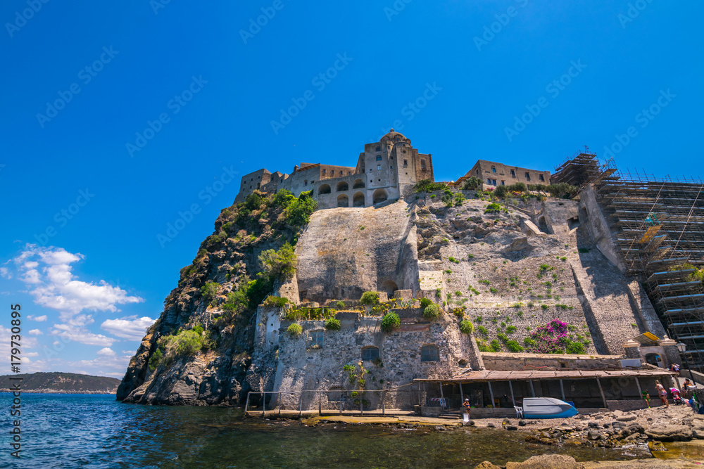 A summer day visiting Aragonese Castle and looking toward Capri and Vesuvi Ischia Ponte, Ischia, Phlegrean Islands, Tyrrhenian Sea, Italy, South Europe