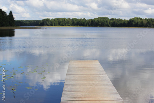 Fototapeta Naklejka Na Ścianę i Meble -  old wooden jetty at a lake