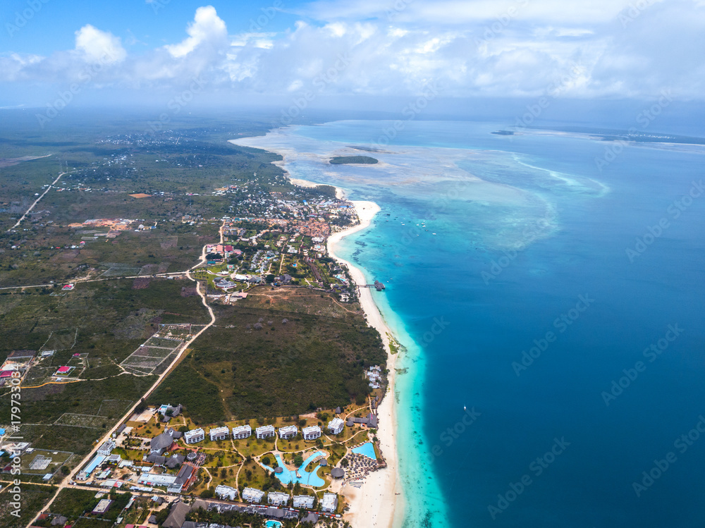 Beautiful Zanzibar Nungwi beach with blue Indian ocean aerial view.