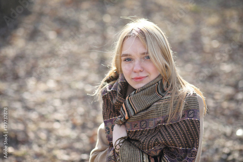 Cute blonde in a city park