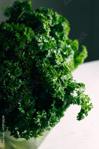 A lot of useful parsley on a light background