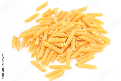 Macaroni on a white background. Products from flour. Varied macaroni. Isolated pasta.