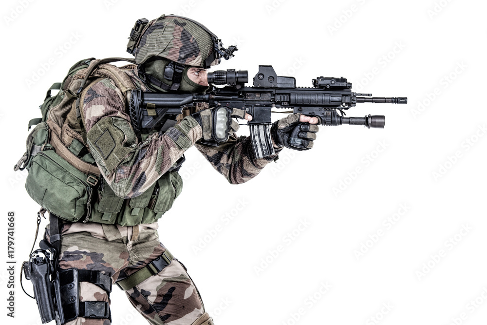 Paratrooper of french 1st Marine Infantry Parachute Regiment RPIMA studio shot firing pointing weapons Paratrooper of french 1st Marine Infantry Parachute Regiment RPIMA studio shot firing pointing weapons