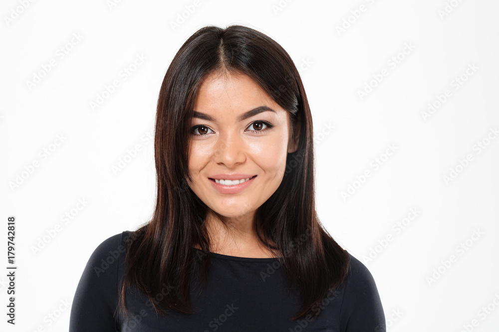 Beautiful young asian lady standing isolated over white background. Beautiful young asian lady standing isolated over white background.