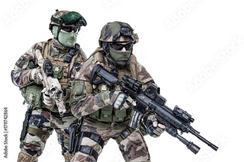 Paratroopers of french 1st Marine Infantry Parachute Regiment RPIMA studio shot firing pointing weapons