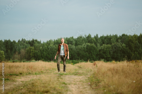 Portrait of a man on field