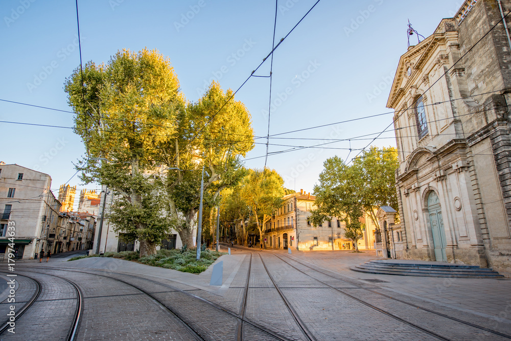 Street view with Saint-Charles chapel during the sunset in Montpellier city in southern France