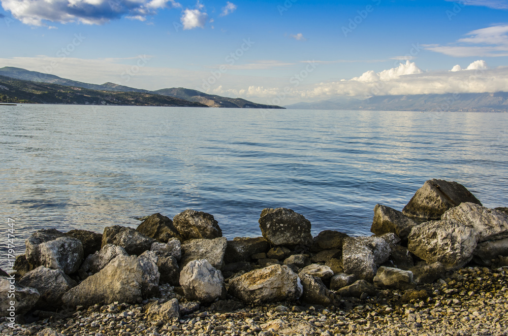 volcanic rocks and calm sea volcanic rocks and calm sea