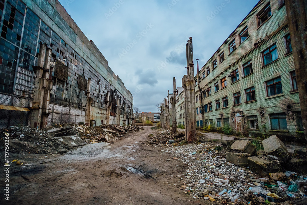 Territory of abandoned industrial area waiting for demolition. Junk at former Voronezh excavator factory 