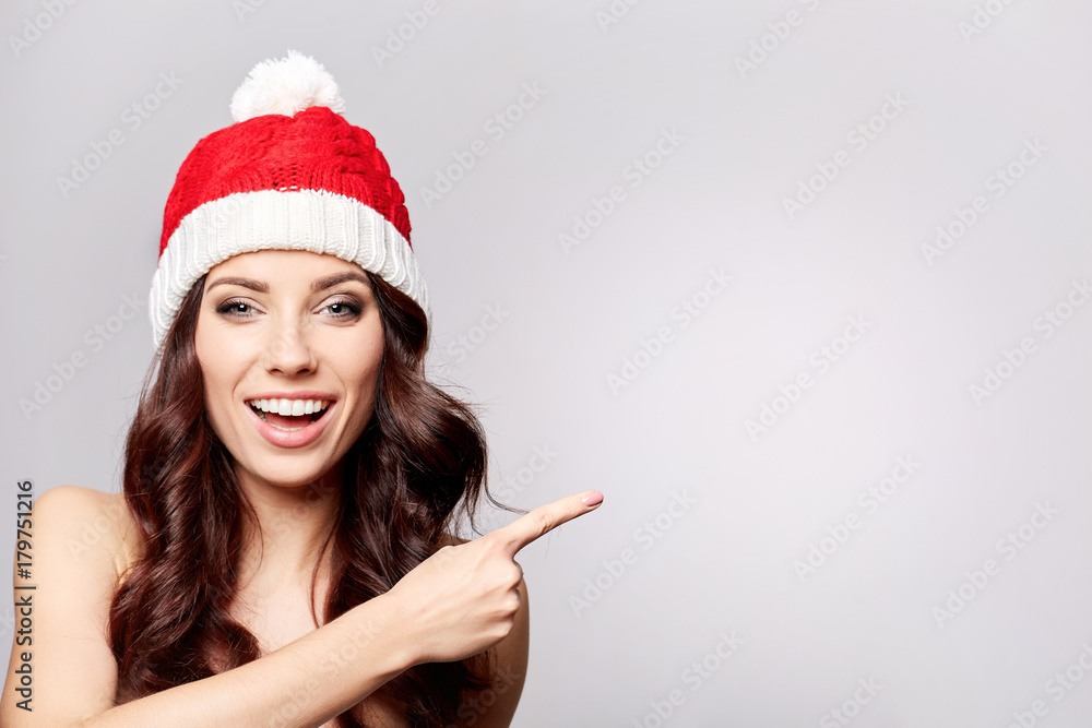 smiling beautiful girl in christmas cap smiling beautiful girl in christmas cap