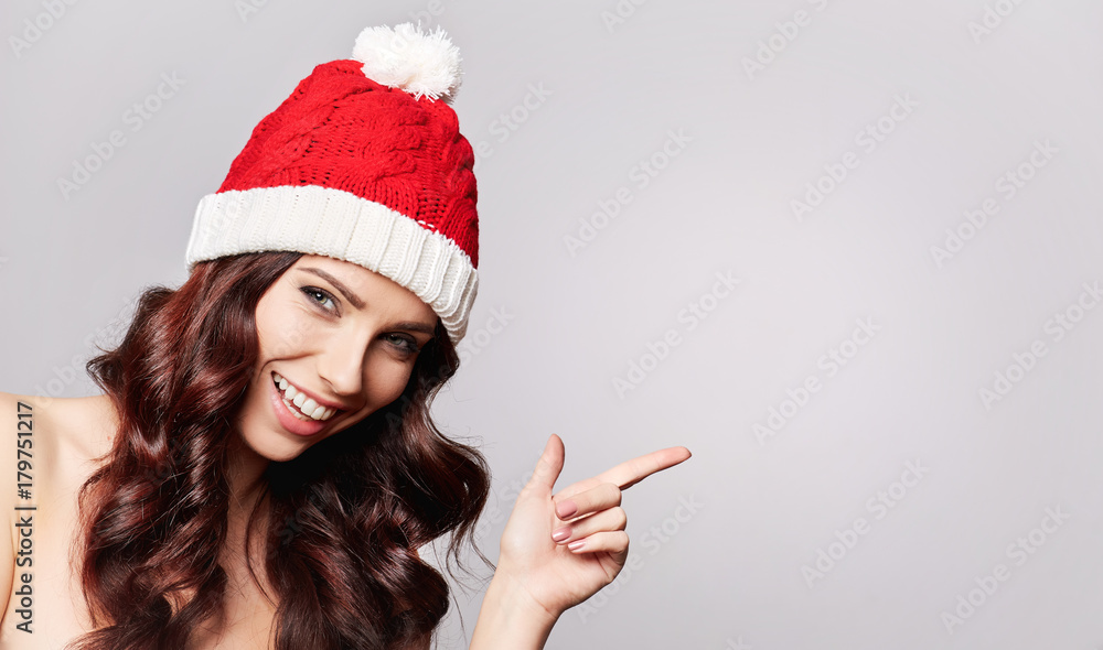 smiling beautiful girl in christmas cap smiling beautiful girl in christmas cap