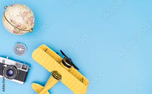 Travel objects concept on blue copy space