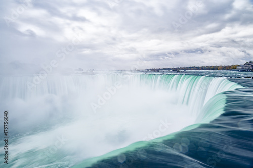 Close up view of the amazing Niagara Falls seen from the Canadian border in Autumn.