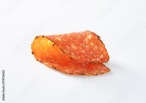 Black pepper-coated salami with cheese