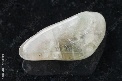 polished Prasiolite (green quartz) stone on dark