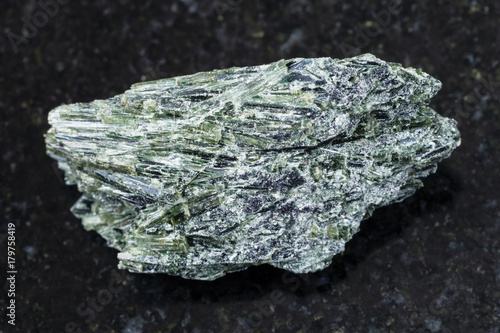 raw Actinolite stone on dark background