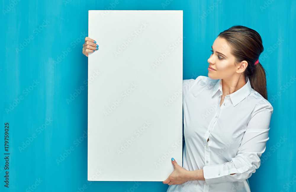 woman holding big white banner with copy space. woman holding big white banner with copy space.
