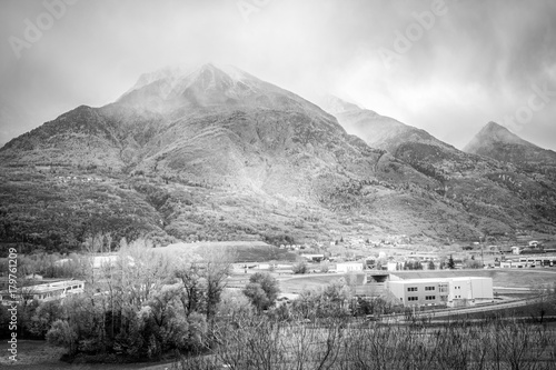 bad weather, autumn landscape in black and white. Mountain in autumn