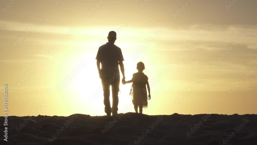 Father and Daughter Sunset Silhouette
