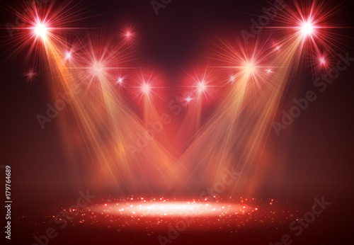Spotlight on stage with smoke and light.