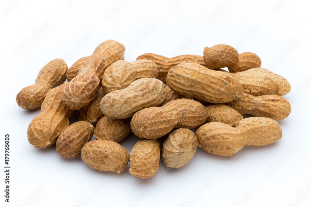 Dried peanuts on the white background. Dried peanuts on the white background.