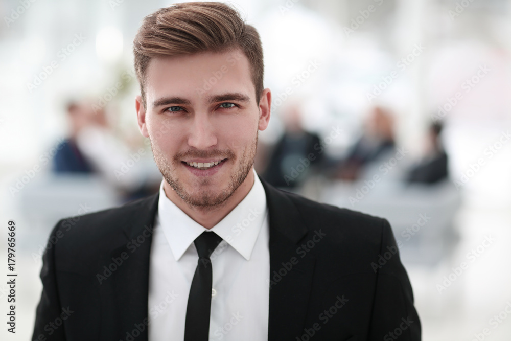 successful businessman on blurred background.