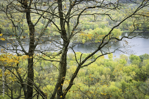 The Wisconsin River flows through a landscape of fall color just before it empties into the mighty Mississippi.  Wyalusing State Park, Wisconsin. photo