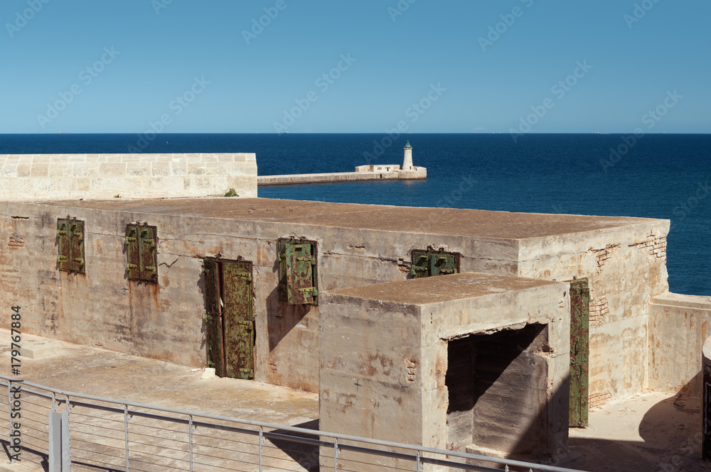 Fort Saint Elmo and lighthouse at the entrance of the Grand Harbour (Malta)