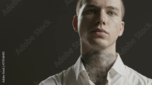 Handsome confident, successful stylish man portrait - neck tattoo - male fashion model - Prores