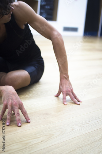 Man yoga teacher in gym