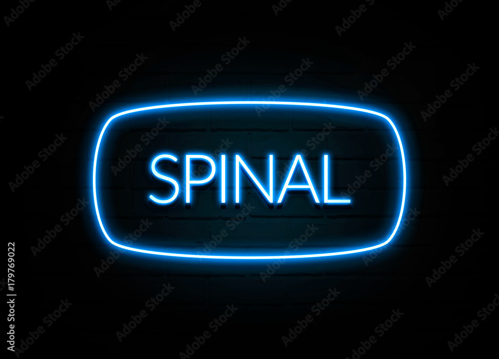 Spinal - colorful Neon Sign on brickwall Spinal - colorful Neon Sign on brickwall