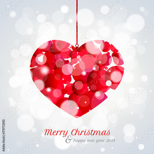 Christmas card 2018 with heart and bokeh