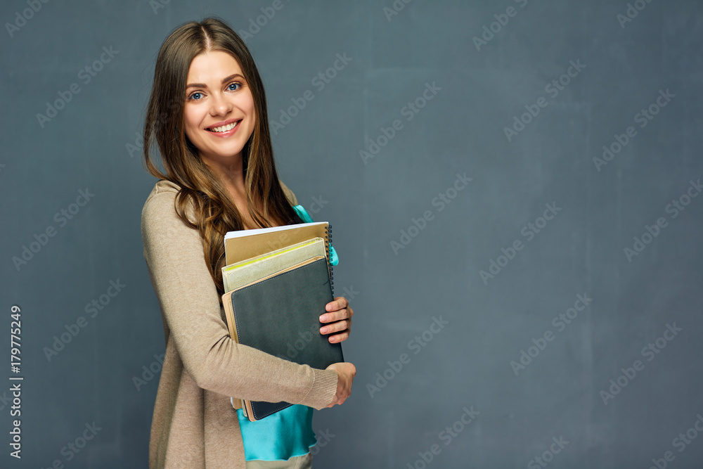 Smiling girl student or woman teacher portrait - obrazy, fototapety, plakaty 